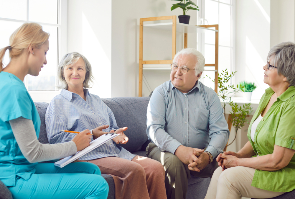 Nurse talking with group of people.
